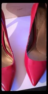 BCBG red patent pumps